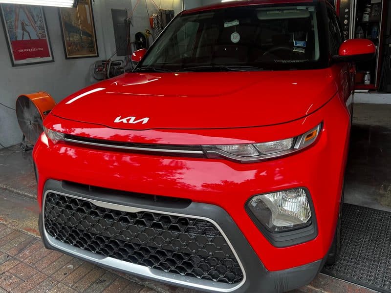 Red Kia Soul after bodywork and paint in Cutler Bay